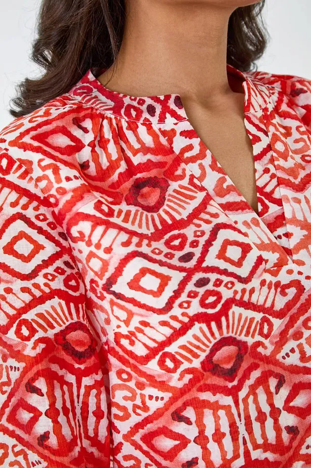 Women Orange Abstract Print Notch Neck Top Roman Tops