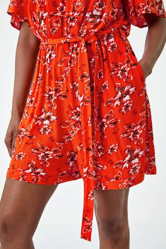 Women Orange Floral Print Pocket Detail Belted Playsuit Roman Dresses